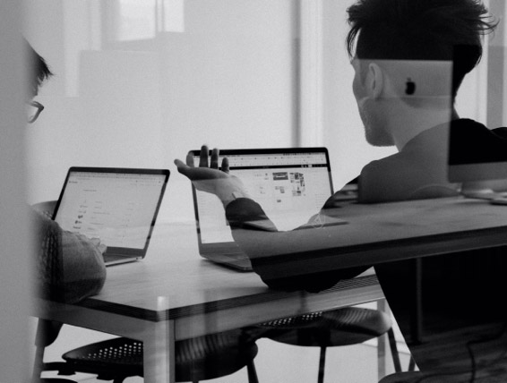 clinical trial black and white, men on laptop